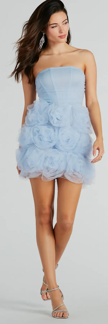 The Toni Strapless Corset Rosette Mesh Party Dress is a mini dress that will make a statement with its short hemline and on-trend details to have you ready for any event!