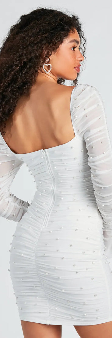 Own the evening in the Tracey Mesh Faux Pearl Bodycon Party Dress in white, a fall cocktail dress perfect for rooftop parties and stylish soirées.