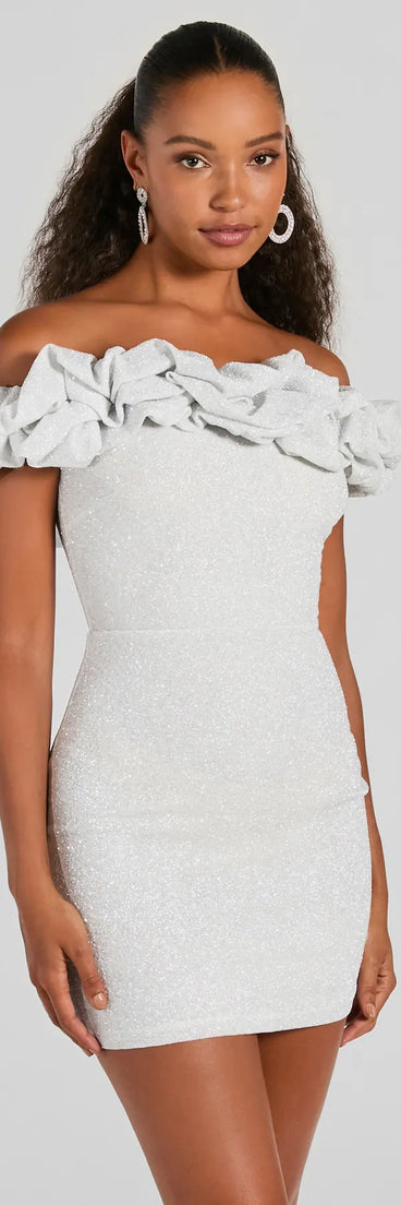 The Ember Off-The-Shoulder Ruffle Glitter Party Dress is a mini dress that will make a statement with its short hemline and on-trend details to have you ready for any event!