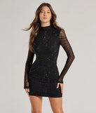 Step into winter chic with the Malia Rhinestone Sheer Mesh Formal Mini Dress, a black mini dress featuring an above-the-knee cut ideal for cocktail parties, festive gatherings, or clubwear.
