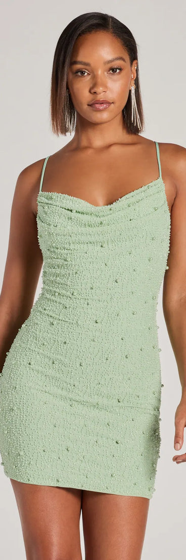 The Keira Faux Pearl Strappy Open-Back Mini Dress is your new go-to sage green dress—effortless, versatile, and made to update your fall style in seconds.