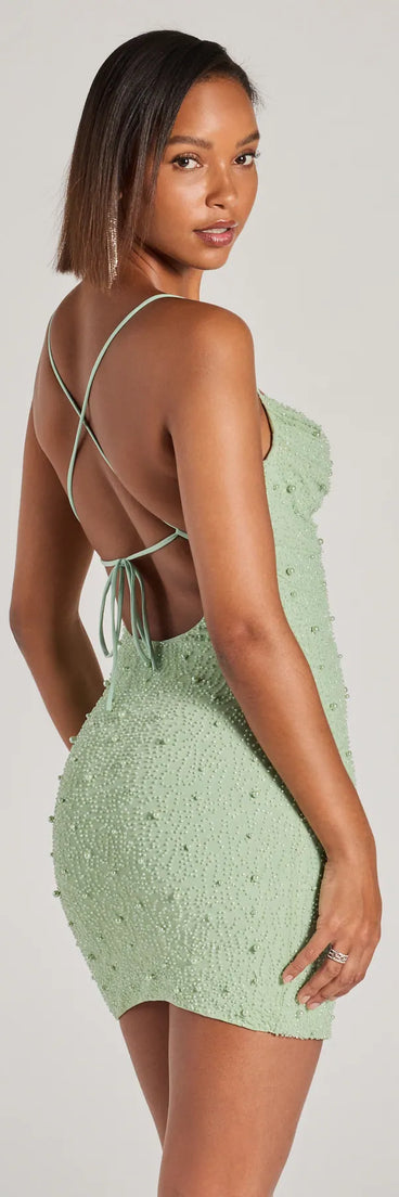 Own your moment in the Keira Faux Pearl Strappy Open-Back Mini Dressin sage green, a standout 2025 Homecoming Dress that captures all the glam and energy of the night.