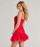 The Lottie Ruched Tulle Corset Mini Dress is a red dress, an essential holiday or NYE dress that pairs chic style with versatility making it perfect for cocktail events, New Year's Eve parties, or as a winter wedding guest look.