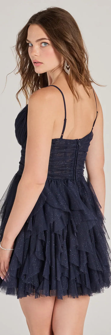Own every entrance in the Leanna Ruffle Glitter Mesh Skater Dress, a navy blue party dress perfect for milestone birthdays and grad parties, or dancing through autumn nights and unforgettable bachelorette celebrations.