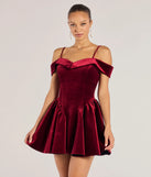 The Andie Velvet Drop Waist Skater Dress is an elegant burgundy formal dress in a rich seasonal color and with unique design accents that make dressing up for winter parties, holiday balls, or festive gatherings effortless!