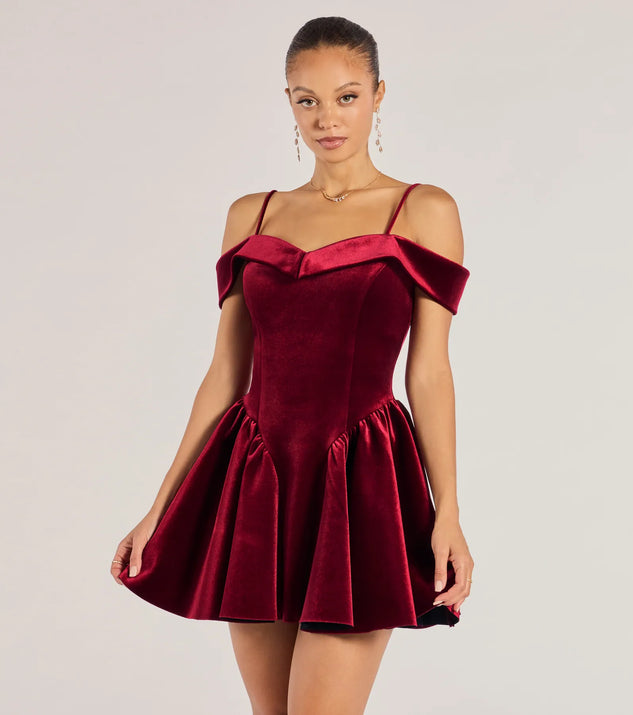 The Andie Velvet Drop Waist Skater Dress is an elegant burgundy formal dress in a rich seasonal color and with unique design accents that make dressing up for winter parties, holiday balls, or festive gatherings effortless!