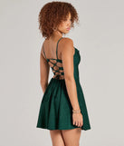 The Jianna Floral Satin Short A-Line Dress is a hunter green holiday dress with a festive style, crafted from luxe fabrics and with unique design accents, a perfect pick as your holiday party dress.