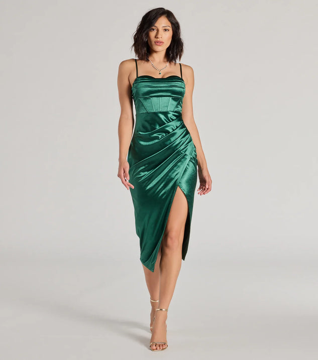 The Myla Corset Satin Asymmetrical Midi Dress is an elegant hunter green formal dress in a rich seasonal color and with unique design accents that make dressing up for winter parties, holiday balls, or festive gatherings effortless!