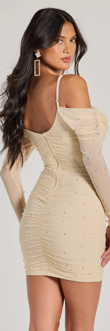 Own every entrance in the Talia Pearl Mesh Cold-Shoulder Mini Dress, a ivory party dress perfect for milestone birthdays and grad parties, or dancing through autumn nights and unforgettable bachelorette celebrations.