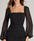 The Meilani Rhinestone Mesh Long Sleeve Mini Dress is an elegant black formal dress in a rich seasonal color and with unique design accents that make dressing up for winter parties, holiday balls, or festive gatherings effortless!
