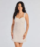 You'll look stunning in the Miriam Pearl Beaded Formal Mini Dress, a white formal dress designed to create an effortless yet standout look as women's formal holiday attire, work party outfit, or NYE dress.