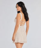 You'll look stunning in the Miriam Pearl Beaded Formal Mini Dress, a white formal dress designed to create an effortless yet standout look as women's formal holiday attire, work party outfit, or NYE dress.