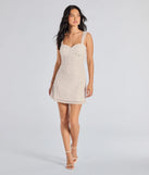 The Miriam Pearl Beaded Formal Mini Dress is a white dress, an essential holiday or NYE dress that pairs chic style with versatility making it perfect for cocktail events, New Year's Eve parties, or as a winter wedding guest look.