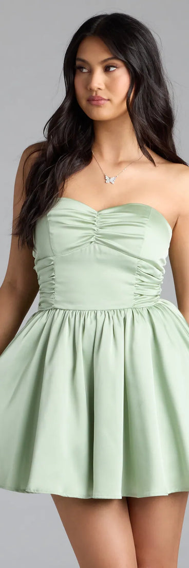Own the evening in the Lorena Satin Strapless Skater Dress in sage green, a fall cocktail dress perfect for rooftop parties and stylish soirées.