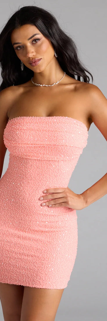 Feel ready for every dance floor moment or feed-worthy reel in the Lena Strapless Bodycon Beaded Mesh Mini Dress, a coral homecoming dress designed to own your moment.