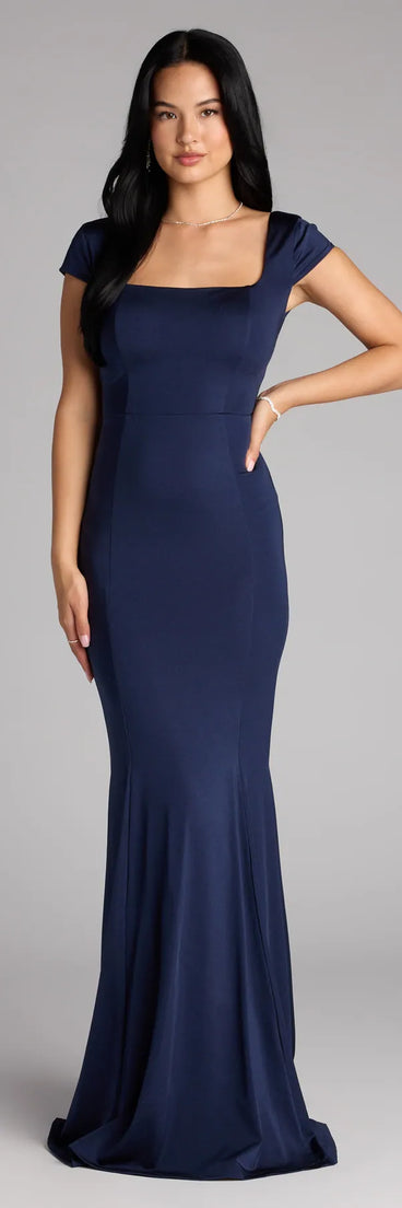 The Gloria Cap Sleeve Tie Back Mermaid Formal Dress is your new go-to navy blue dress—effortless, versatile, and made to update your fall style in seconds.