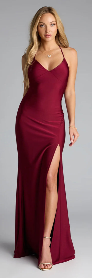 The Becky V-Neck Tie-Back Slit Mermaid Dress is your new go-to burgundy dress—effortless, versatile, and made to update your fall style in seconds.