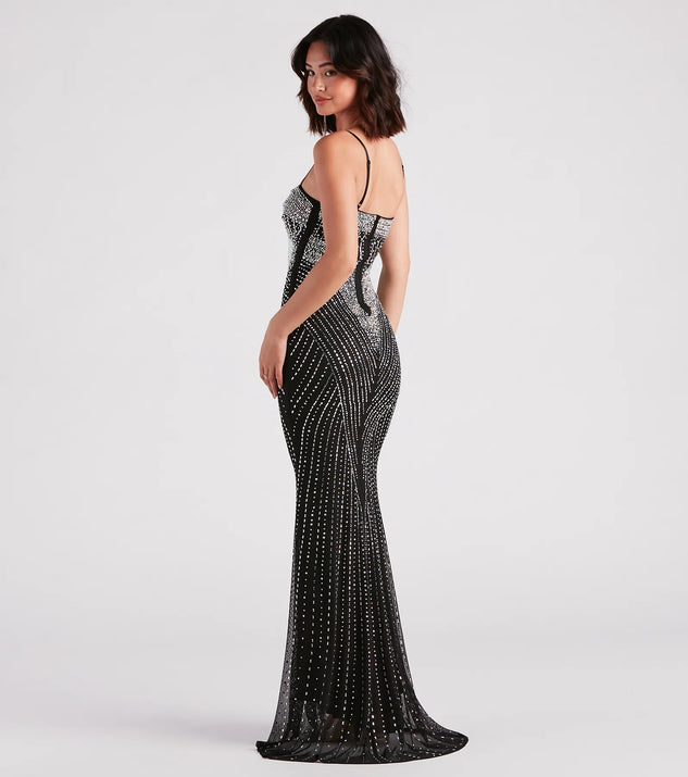 The Tori Formal Rhinestone Mermaid Long Dress is a black holiday dress with a festive style, crafted from luxe fabrics and with unique design accents, a perfect pick as your holiday party dress.