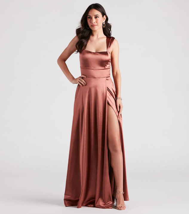 The Lisa Satin High Slit A-Line Formal Dress is an elegant copper formal dress in a rich seasonal color and with unique design accents that make dressing up for winter parties, holiday balls, or festive gatherings effortless!