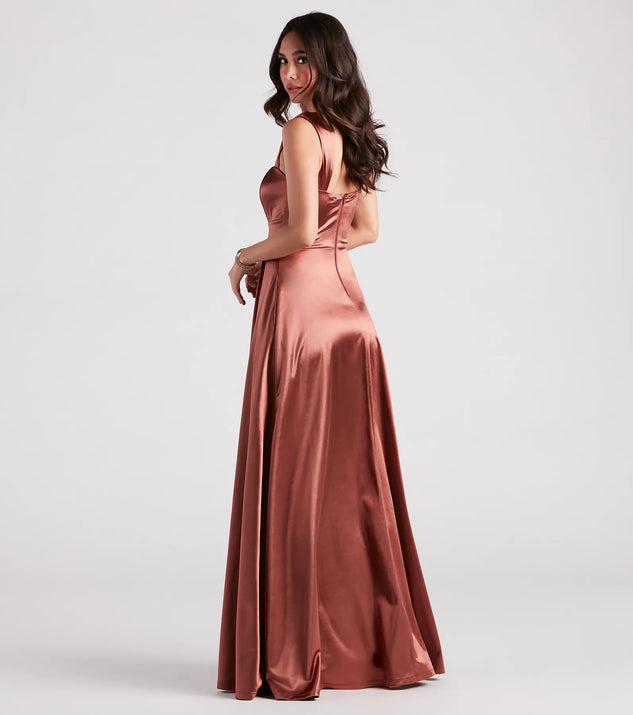 The Lisa Satin High Slit A-Line Formal Dress is an elegant copper formal dress in a rich seasonal color and with unique design accents that make dressing up for winter parties, holiday balls, or festive gatherings effortless!