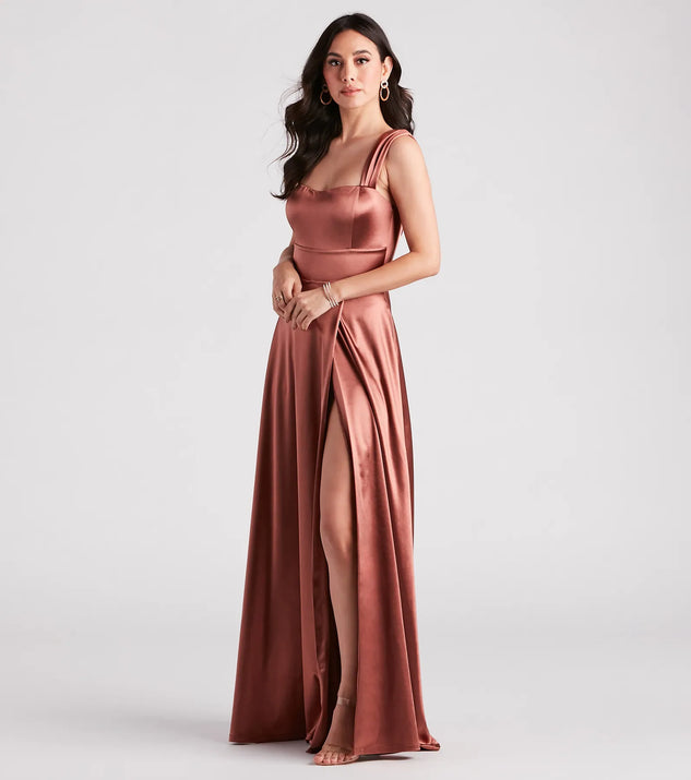 The Lisa Satin High Slit A-Line Formal Dress is an elegant copper formal dress in a rich seasonal color and with unique design accents that make dressing up for winter parties, holiday balls, or festive gatherings effortless!