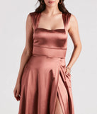 The Lisa Satin High Slit A-Line Formal Dress is an elegant copper formal dress in a rich seasonal color and with unique design accents that make dressing up for winter parties, holiday balls, or festive gatherings effortless!