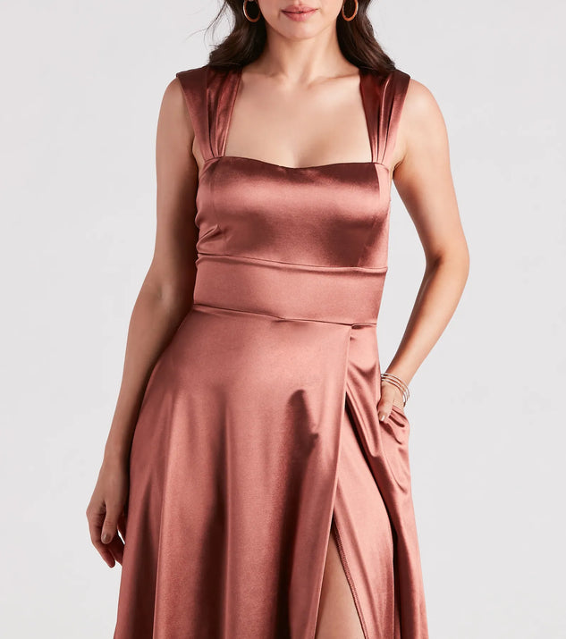 The Lisa Satin High Slit A-Line Formal Dress is an elegant copper formal dress in a rich seasonal color and with unique design accents that make dressing up for winter parties, holiday balls, or festive gatherings effortless!