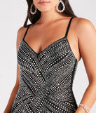 The Josselyn Formal Rhinestone Slim Long Dress is an elegant black formal dress in a rich seasonal color and with unique design accents that make dressing up for winter parties, holiday balls, or festive gatherings effortless!