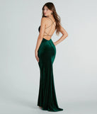 The Brenda Formal Velvet Strappy Mermaid Dress is a hunter green dress, an essential holiday or NYE dress that pairs chic style with versatility making it perfect for cocktail events, New Year's Eve parties, or as a winter wedding guest look.