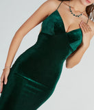 The Brenda Formal Velvet Strappy Mermaid Dress is a hunter green dress, an essential holiday or NYE dress that pairs chic style with versatility making it perfect for cocktail events, New Year's Eve parties, or as a winter wedding guest look.