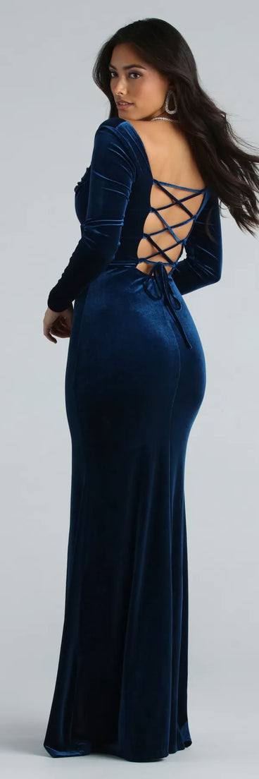 Turn heads at Prom 2025 in this teal prom dress, where statement-making details meet the iconic style of the Pam Formal Velvet Long Sleeve Mermaid Dress .