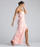 The Gabby Formal Mesh Strapless Ruffle Long Dress is an elegant pink formal dress in a rich seasonal color and with unique design accents that make dressing up for winter parties, holiday balls, or festive gatherings effortless!