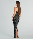 Turn heads with the Aubrie Formal Rhinestone And Pearl Mesh Long Dress, a black New Year's Eve dress featuring a festive style and glamorous accents, ideal for any NYE celebration or cocktail party.