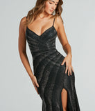 The stunning Tessa Formal Rhinestone Mermaid Slit Long Dress provides a chic silhouette and party-ready details that make it a standout black dress for cocktail events, New Year's Eve parties, or as a winter wedding guest look.