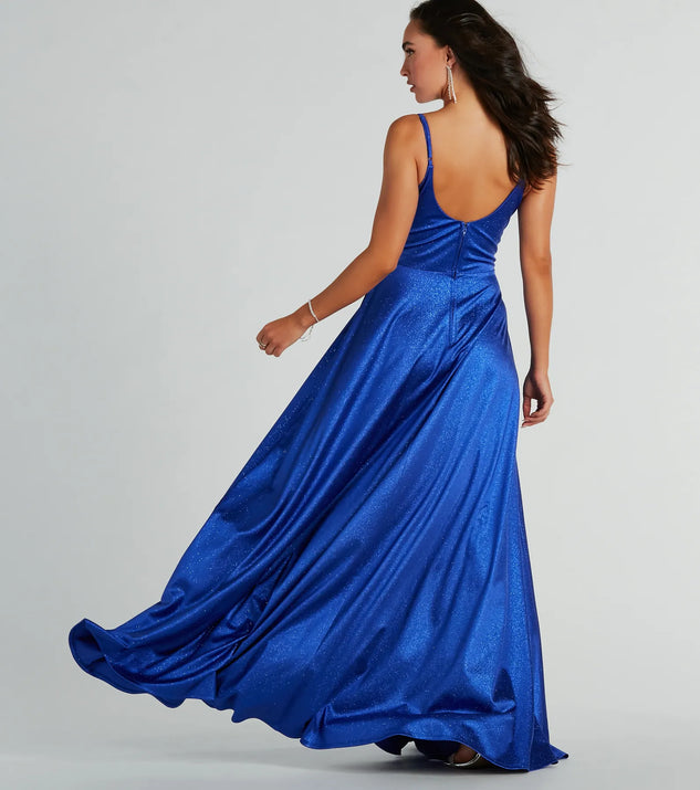 The Amina Scoop Neck A-Line Glitter Formal Dress is an elegant royal blue formal dress in a rich seasonal color and with unique design accents that make dressing up for winter parties, holiday balls, or festive gatherings effortless!