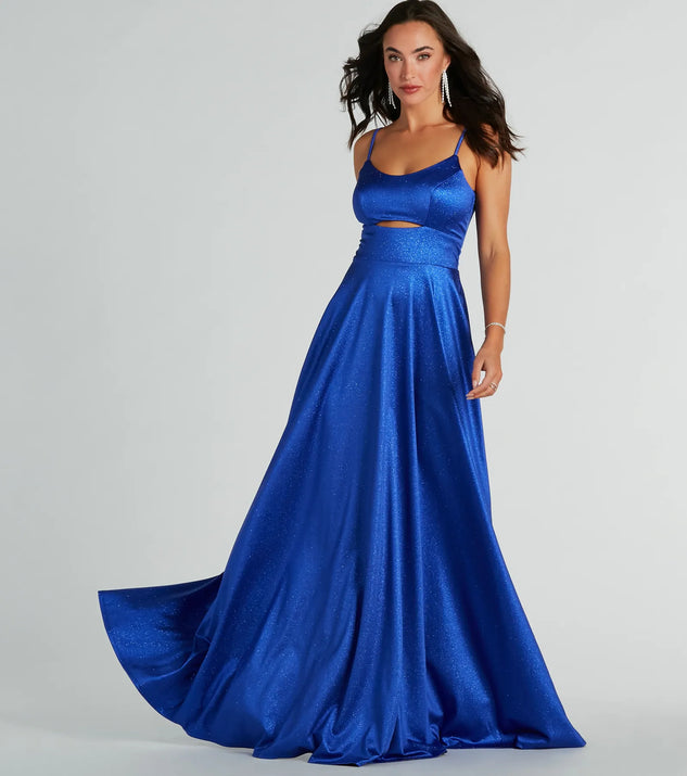 The Amina Scoop Neck A-Line Glitter Formal Dress is an elegant royal blue formal dress in a rich seasonal color and with unique design accents that make dressing up for winter parties, holiday balls, or festive gatherings effortless!
