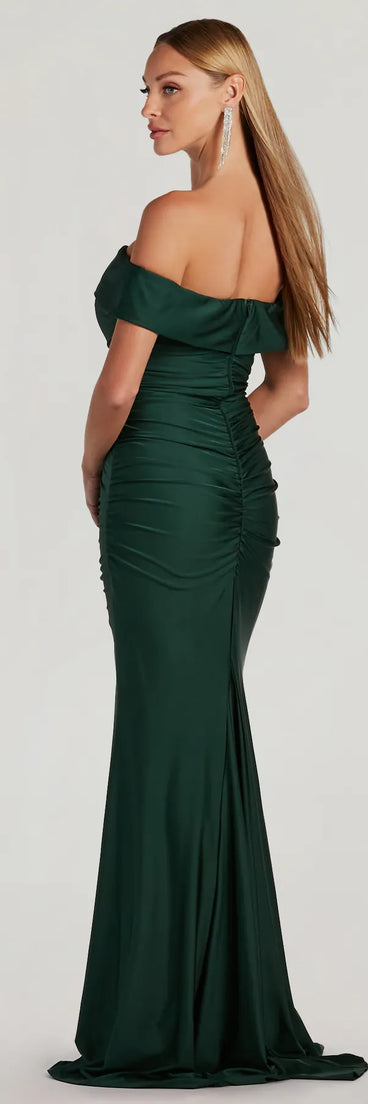 The Alicia Off-The-Shoulder Mermaid Formal Dress in hunter is a stunning green prom dress designed to capture attention with its fresh or bold color and effortlessly stylish silhouette.