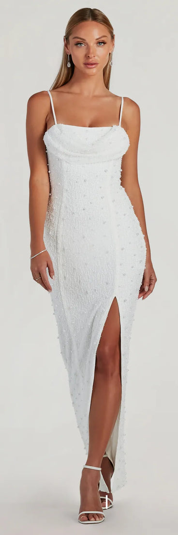 Turn heads at HOCO 2025 in this white homecoming dress, where statement-making details meet the iconic style of the Klara Cowl Neck Faux Pearl Bead Slim Formal Dress.