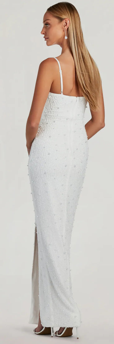 Own the spotlight in the Klara Cowl Neck Faux Pearl Bead Column Dress, a white formal dress crafted to deliver luxe style for fall weddings, military balls, or any special event.