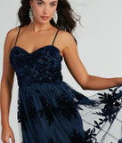 The Thelma Sweetheart A-Line Velvet Tulle Dress is an elegant navy blue formal dress in a rich seasonal color and with unique design accents that make dressing up for winter parties, holiday balls, or festive gatherings effortless!