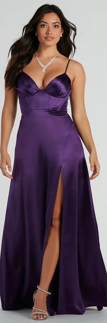 The Haley Corset Slit A-Line Satin Formal Dress is an elegant purple formal dress in a rich seasonal color and with unique design accents that make dressing up for winter parties, holiday balls, or festive gatherings effortless!