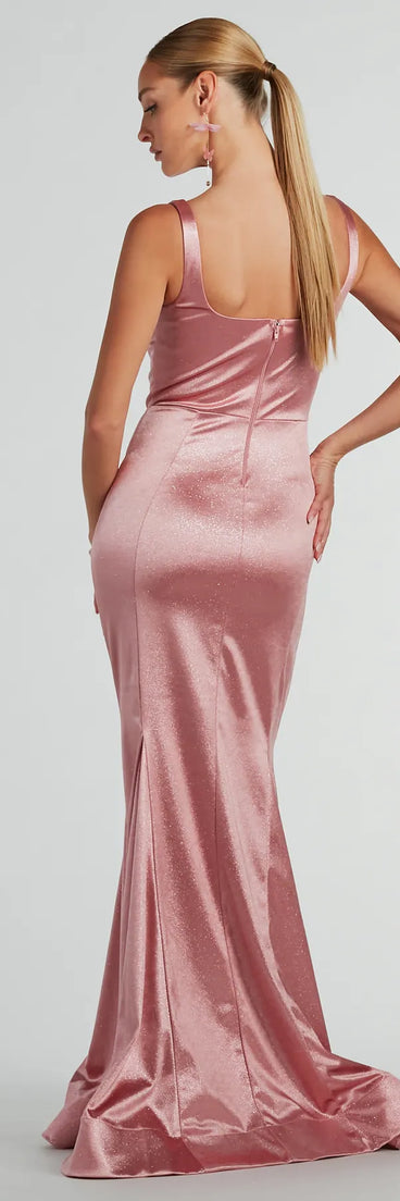 You'll be the best dressed in the Ria Bustier Mermaid Glitter Satin Formal Dress as your winter formal dress with beautiful and unique details from Windsor.