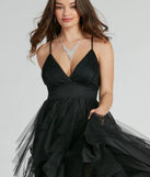 The Wynonna V-Neck A-Line Ruffle Glitter Formal Dress is an elegant black formal dress in a rich seasonal color and with unique design accents that make dressing up for winter parties, holiday balls, or festive gatherings effortless!