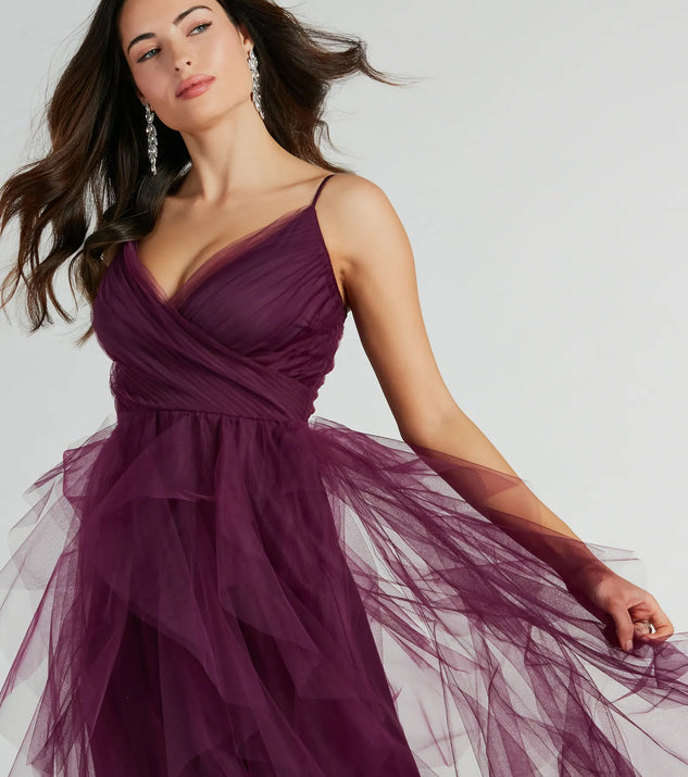 The Hadley V-Neck Ruffled A-Line Tulle Formal Dress is an elegant eggplant purple formal dress in a rich seasonal color and with unique design accents that make dressing up for winter parties, holiday balls, or festive gatherings effortless!