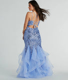 The Sylvia Lace-Up Mermaid Tulle Ruffle Sequin Dress is a dazzling periwinkle sequin dress, perfect for making a bold entrance at any event, from cocktail parties to formal celebrations.