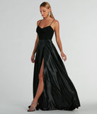 The Ammara Cowl Neck Slit A-Line Satin Formal Dress is an elegant black formal dress in a rich seasonal color and with unique design accents that make dressing up for winter parties, holiday balls, or festive gatherings effortless!