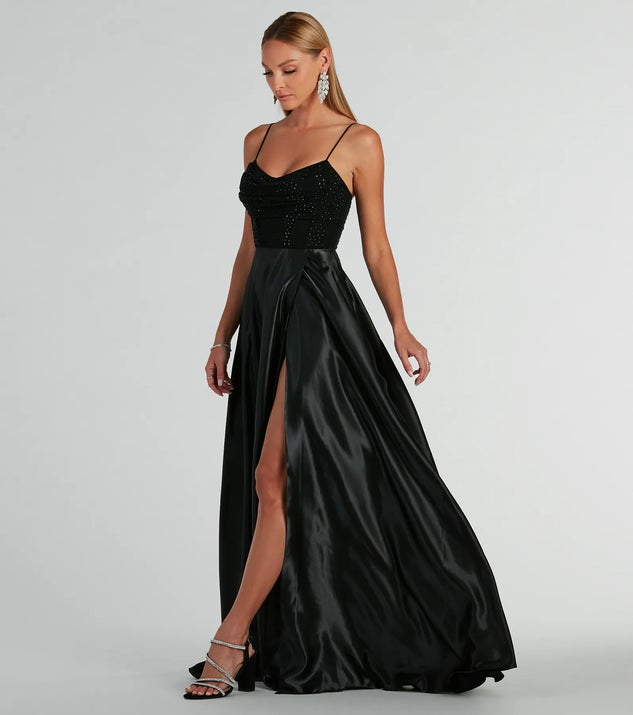 The Ammara Cowl Neck Slit A-Line Satin Formal Dress is an elegant black formal dress in a rich seasonal color and with unique design accents that make dressing up for winter parties, holiday balls, or festive gatherings effortless!