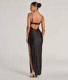 The Arianna Sleeveless Cutout Long Slim Formal Dress is an elegant black formal dress in a rich seasonal color and with unique design accents that make dressing up for winter parties, holiday balls, or festive gatherings effortless!