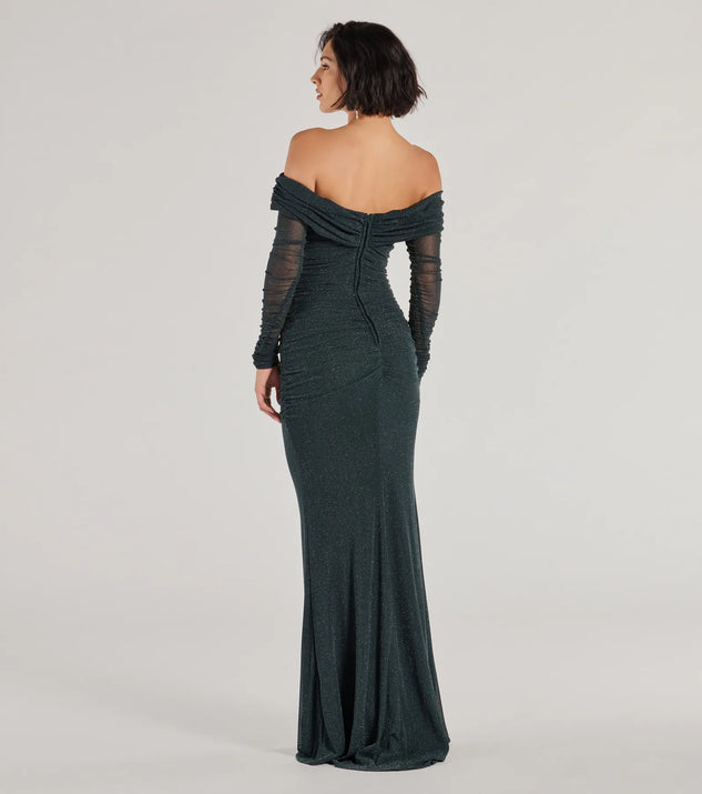 Get festive with the Tova Off The Shoulder Glitter Mermaid Dress, a sparkly long sleeve dress in hunter green that's perfect for holiday season formals, winter dances, or as a statement-making NYE outfit.