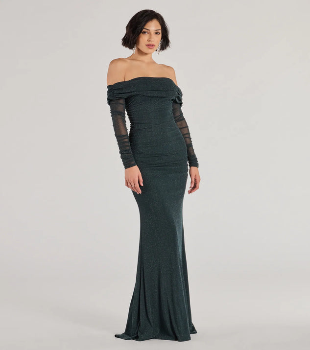 Get festive with the Tova Off The Shoulder Glitter Mermaid Dress, a sparkly long sleeve dress in hunter green that's perfect for holiday season formals, winter dances, or as a statement-making NYE outfit.